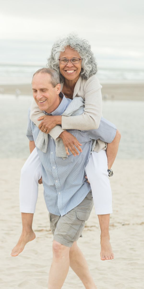 Happy Old Couple on a Beach Happy Old Couple on a Beach